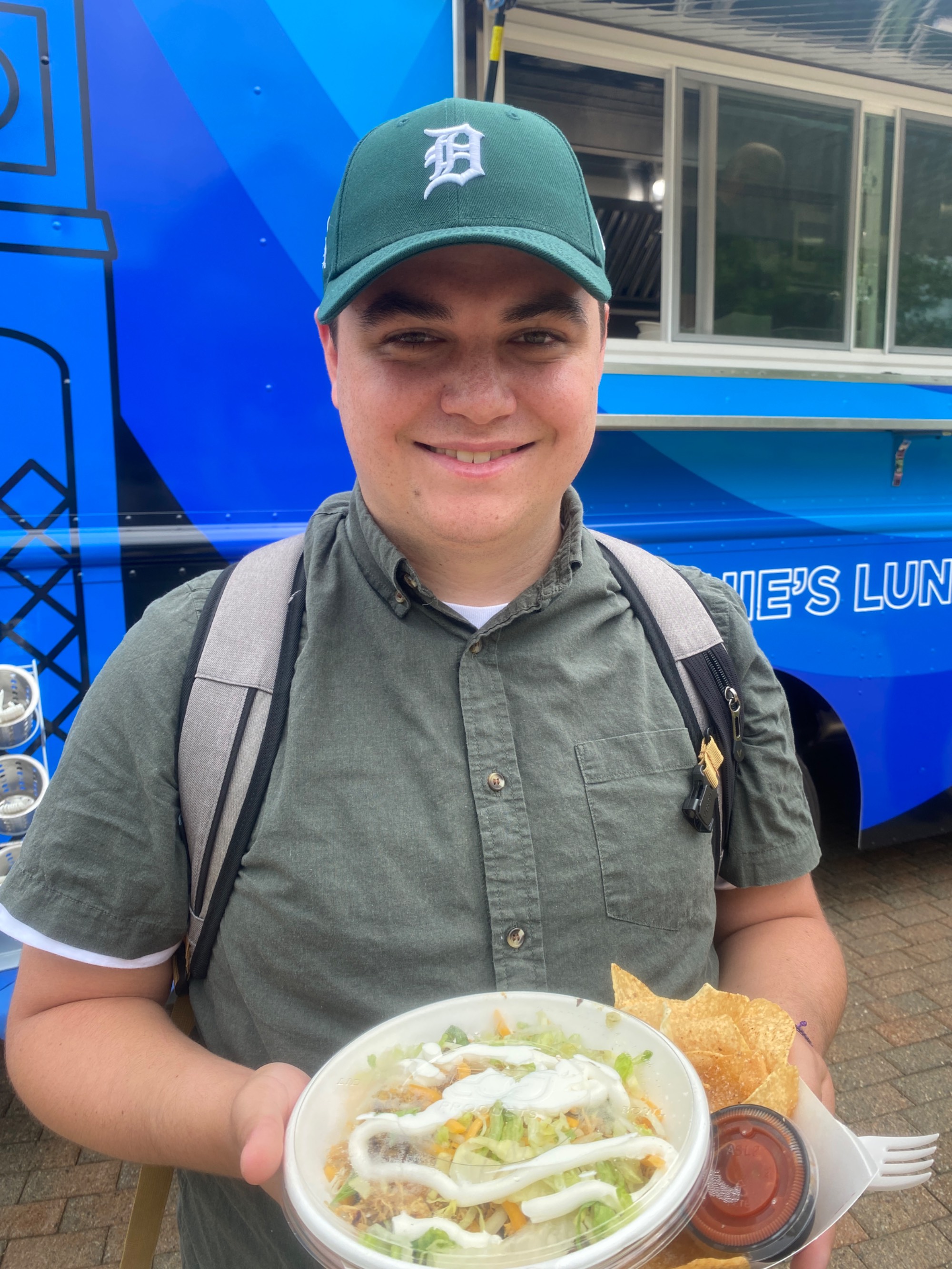 student with burrito bowl